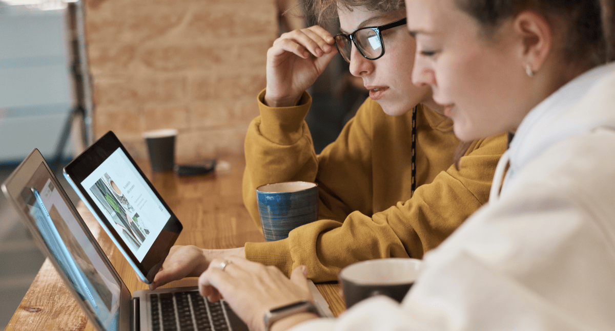 two-women-working-on-website