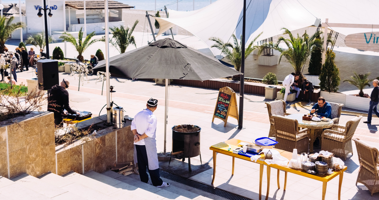 Outdoors hotel restaurant area.